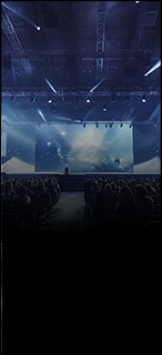 Product launch presentation on a large stage screen